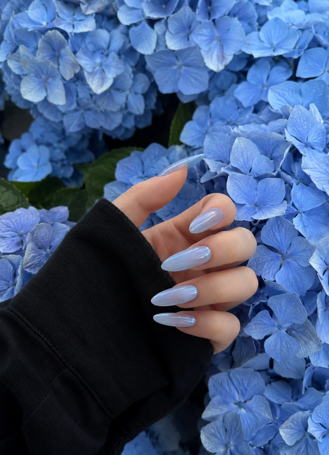 Cool-toned blue chrome nails